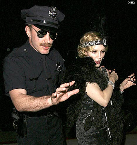 Flapper girl Madonna and Village People cop Guy