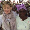 Madonna posted this picture, commenting: "With a Woman from Nijiti Village in Malawi where we have built 10 schools with Build On! Equal attendance Girls and Boys! YEAH!"