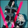 Queens of pop! In this newly released image from V Magazine, Katy Perry appears to be preparing to punch Madonna