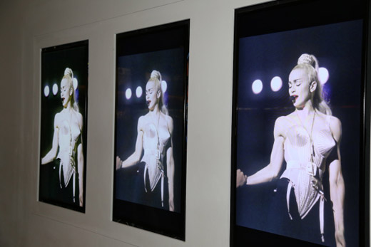 Madonna posed by these Warholian images in the lobby - Photo by Matthew Rettenmund