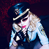 Madonna celebrating her 61st birthday, dressed up as a general. Photo by Ricardo Gomes.