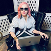 Madonna with pink hair, writing the screenplay for her upcoming biopic.