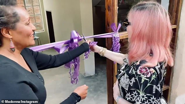 The Queen of Pop was officially at the school to cut the ribbon at the grand opening of the Madame X Dance Studio