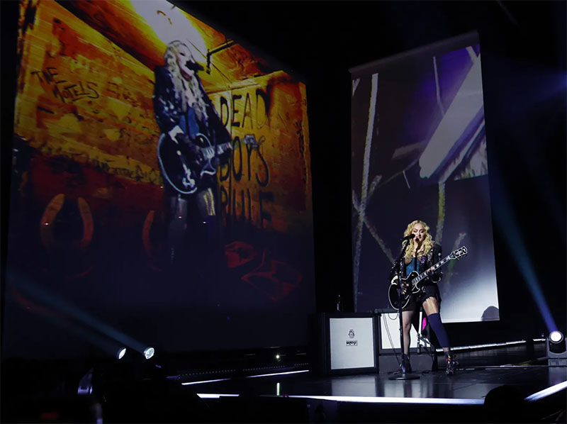 Madonna playing “Burning Up” at the O2 Arena on October 15, 2023 Photo by Kevin Mazur/WireImage for Live Nation