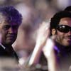 Pedro Almodovar and Lenny Kravitz arrive to attend the show