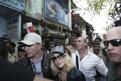 Madonna & Guy in the slums of Mumbai, India