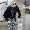 Madonna tests a new water pump at her project in Malawi