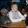 Madonna attends class in her Malawi school with David and Mercy
