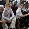 Pop Star Madonna sits with her biological and adopted children David Banda, Lourdes, Mercy James, and Rocco
