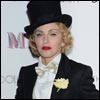 Sparkling star: Madonna also sported a chainmail fingerless glove on one hand a monogram 'M' ring on the other