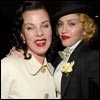 Firm friends: Madonna wrapped an arm around Debi Mazar inside the star-studded party