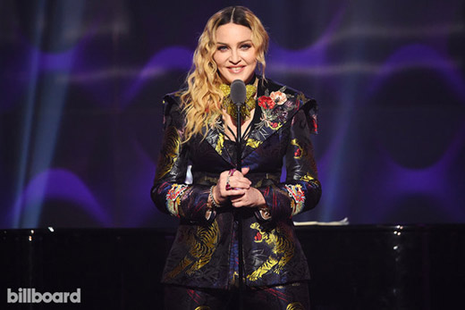 Madonna accepts the award for Woman of the Year