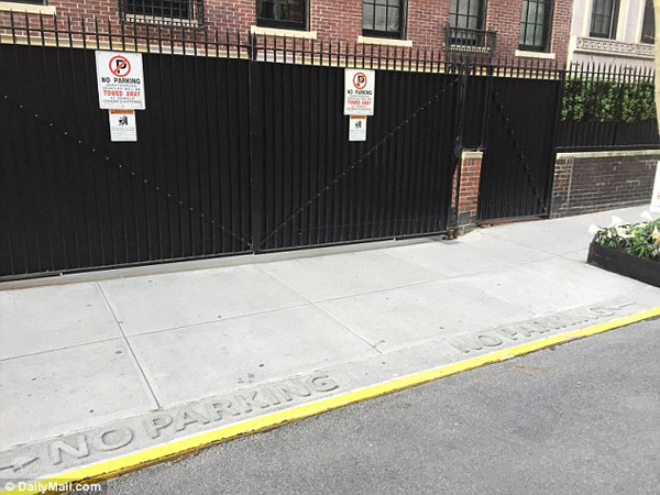 Daily Mail: The pop icon also had the words 'No parking' imprinted along the edge of the sidewalk, and painted the curb yellow.