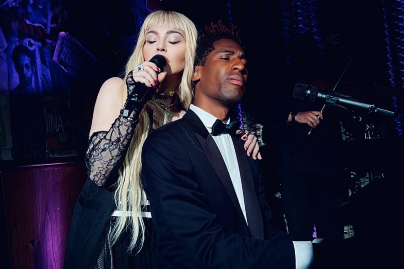 Madonna performs with Jon Baptiste at the Red Rooster bar in Harlem
