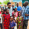 David during the visit in Malawi. His father Yihane Banda stands behind him.